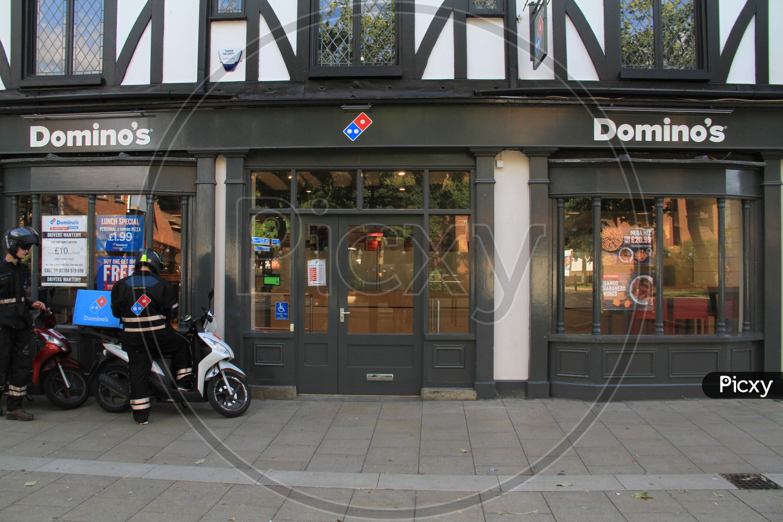 Domino's Delivery Boys with Bikes at Outlet