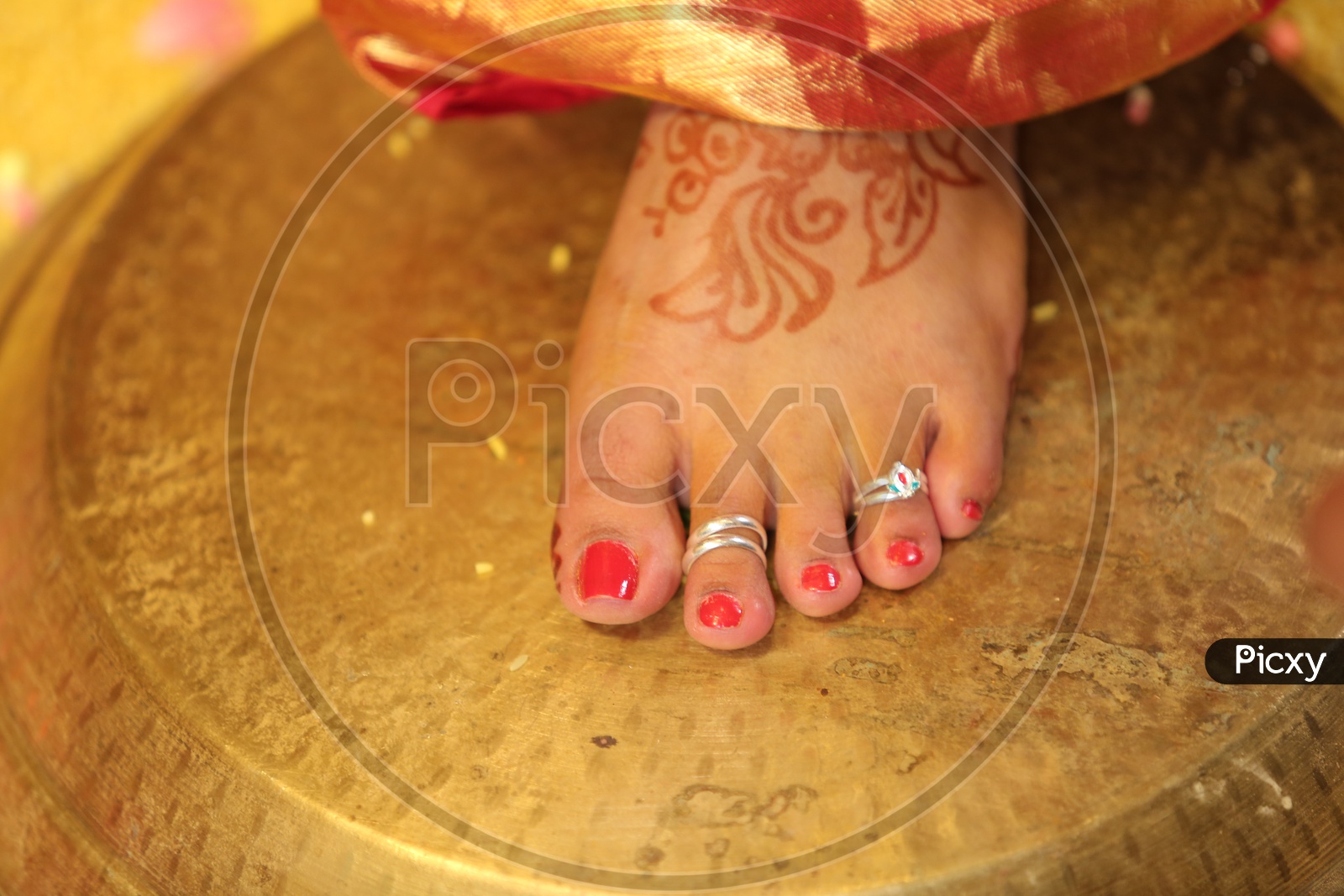 Indian Bride with toe rings during wedding
