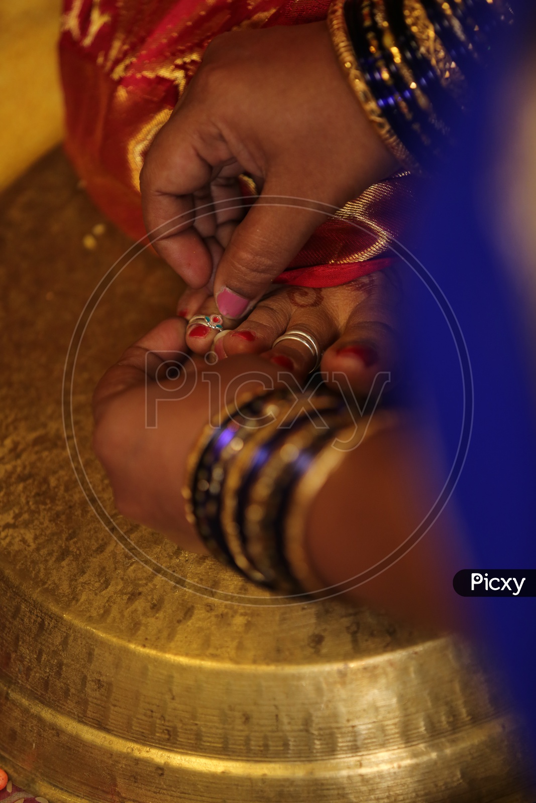 Indian Bride during presentation of Toe ring