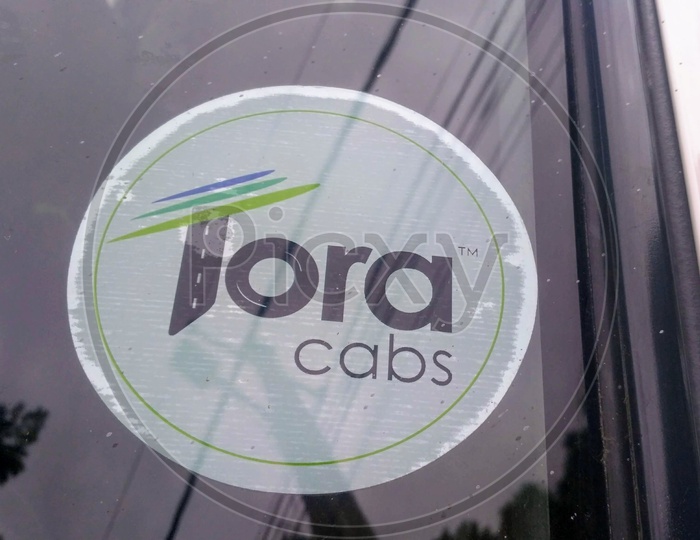 Tora Cabs Logo