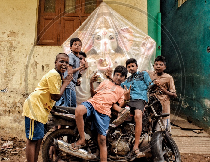 The kids getting excited and posing with Lord GANESHA in the streets of Chennai.