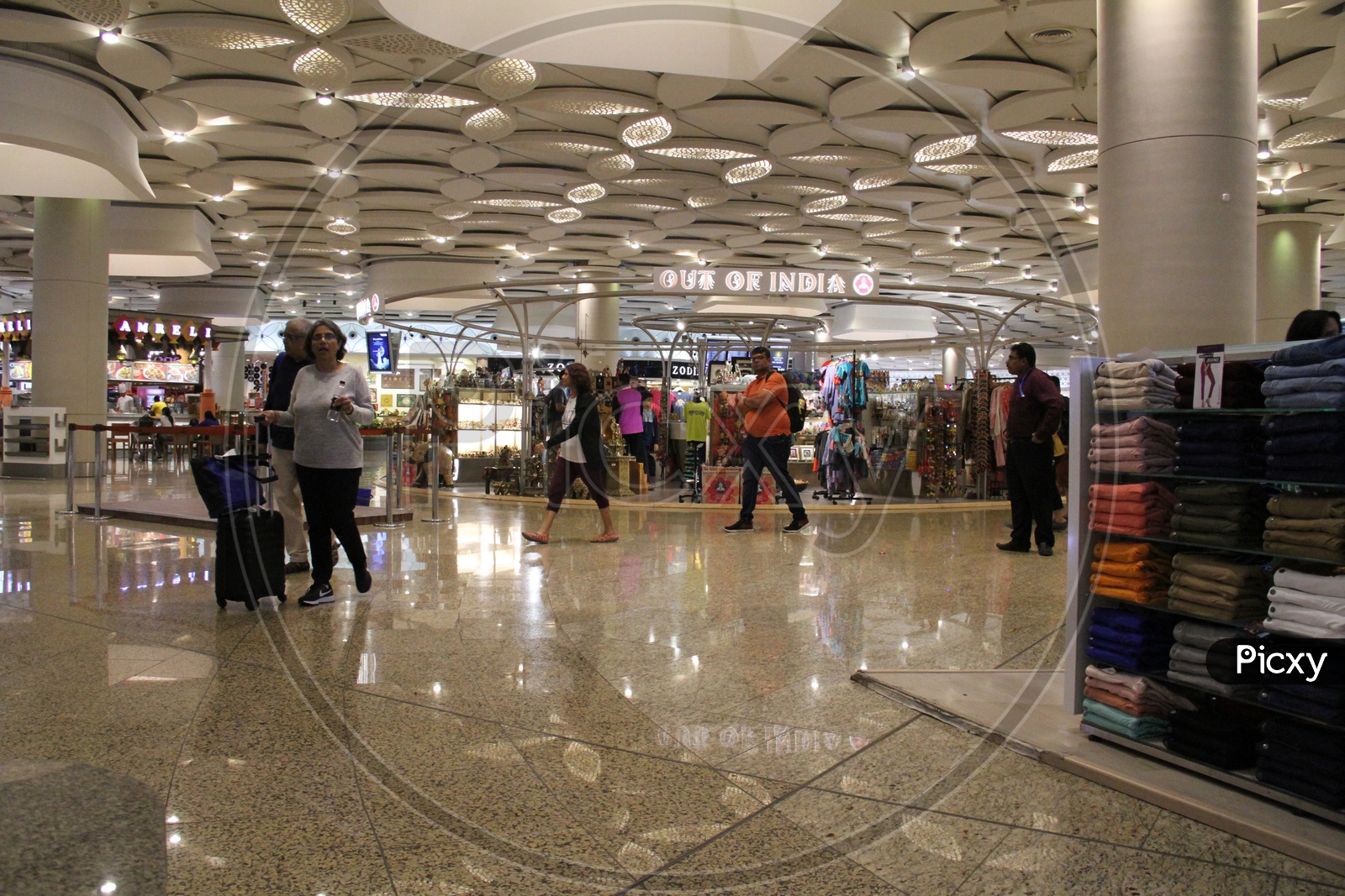 People walking inside Mumbai Airport or Chhatrapati Shivaji International Airport
