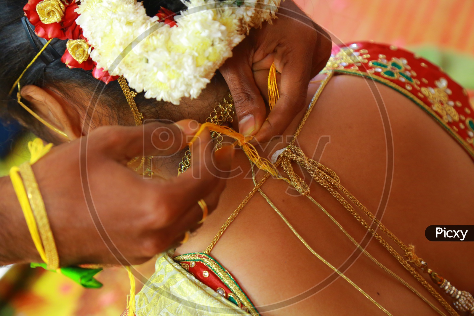 Indian Bride Groom tying Mangalsutra