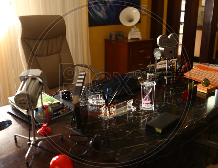 Office table of a movie celebrate, Miniature of camera, clap, lights