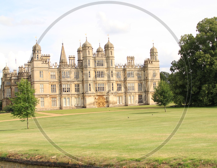 Burghley House with Clouds in Background