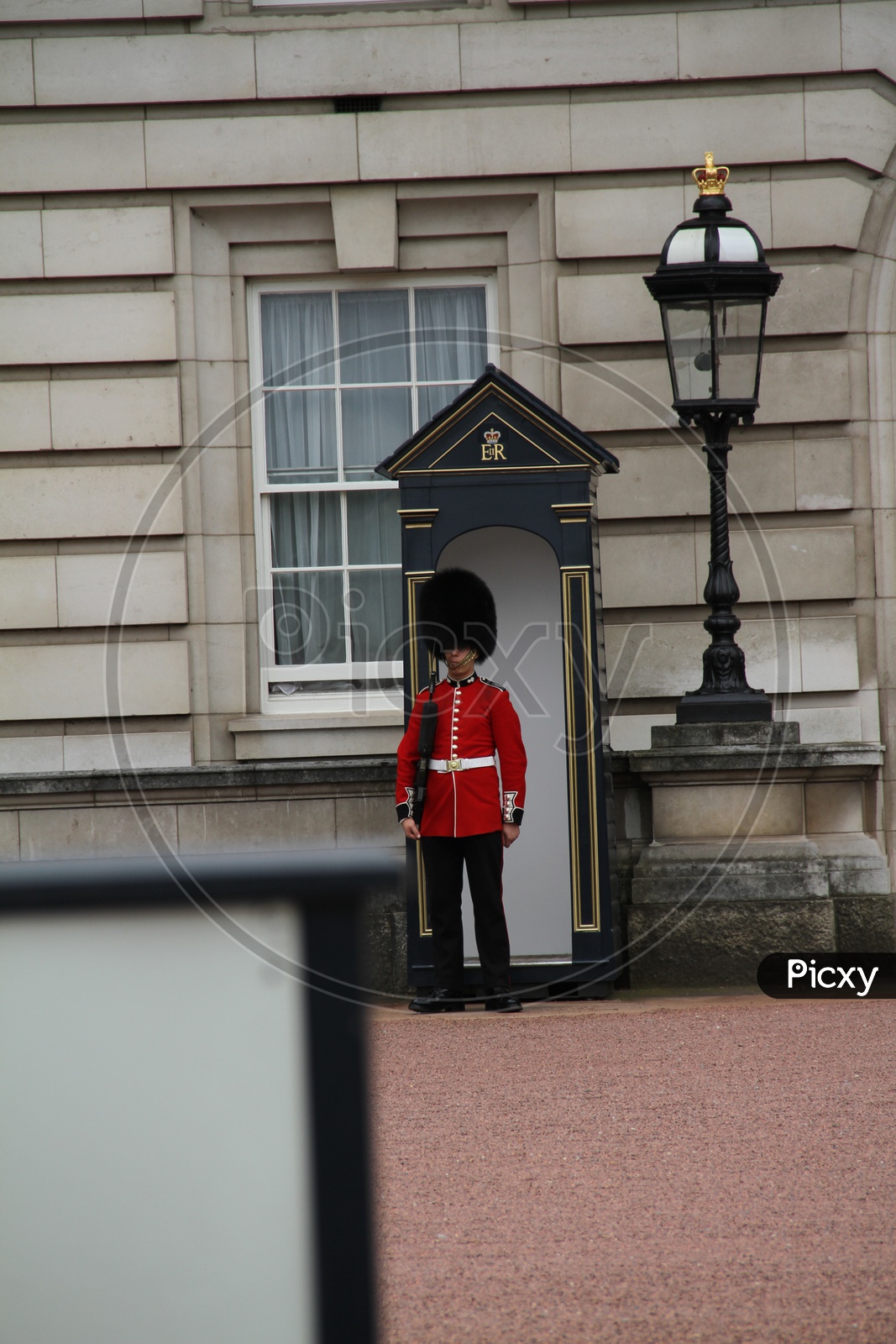 Queens Guards in Red Uniform at Buckingham Palace