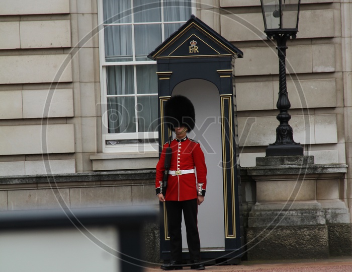 Queens Guards in Red Uniform at Buckingham Palace