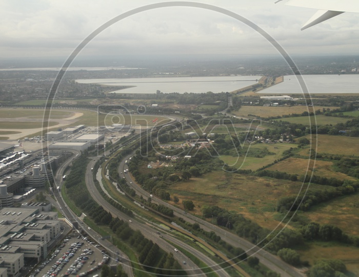 Aerial View of London Airport with Road Connection