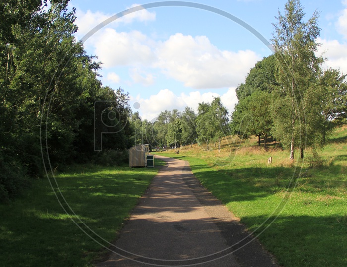 Pathway in Ferry Meadows Caravan and Motorhome Club Site with Clouds in Sky