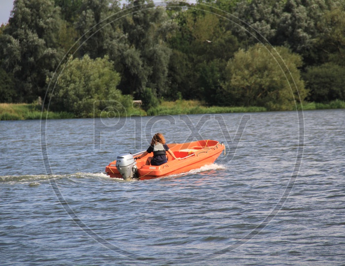 A Woman in Speed Boat at Ferry Meadows Caravan and Motorhome Club Site