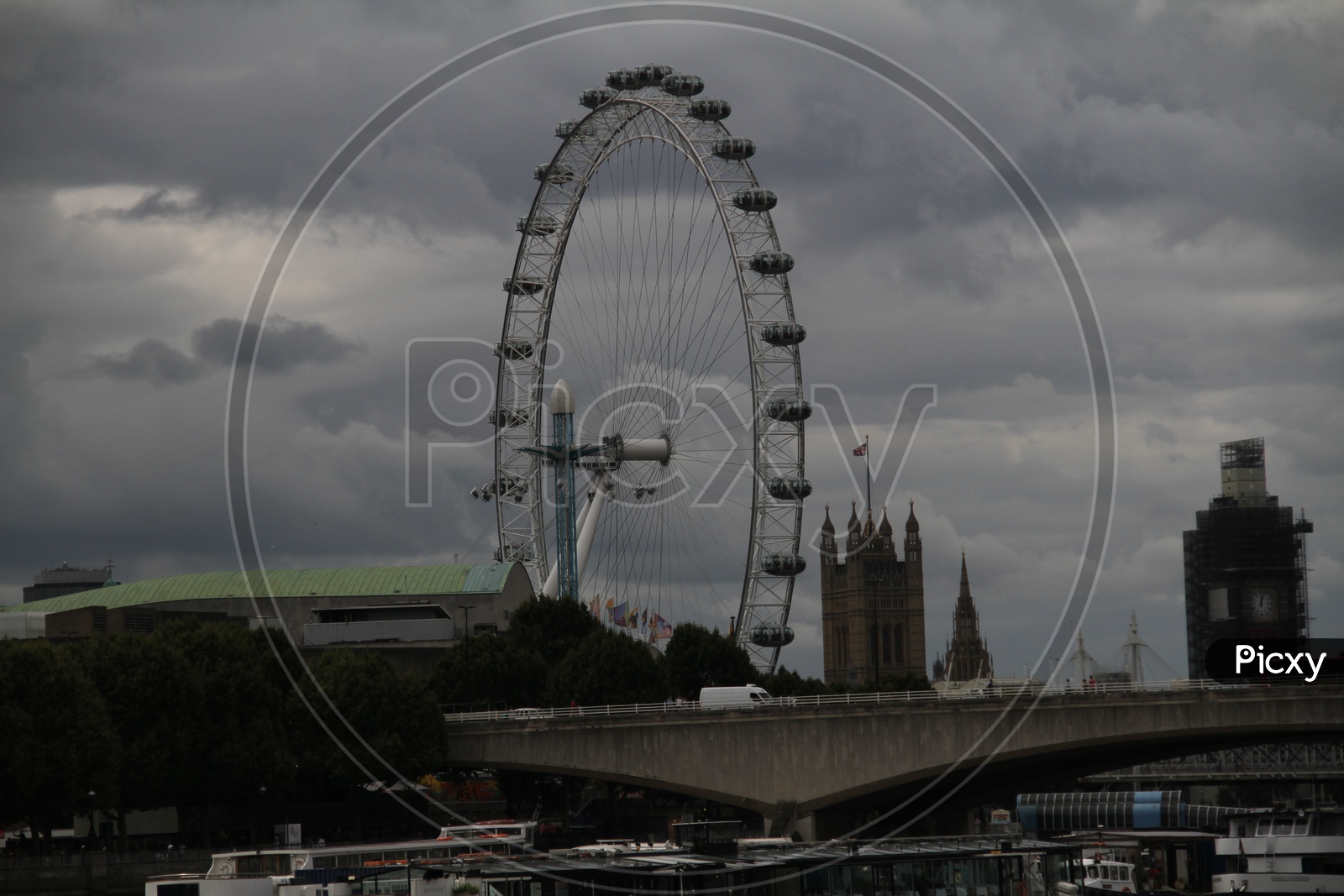 London Eye with clouds in Sky Background