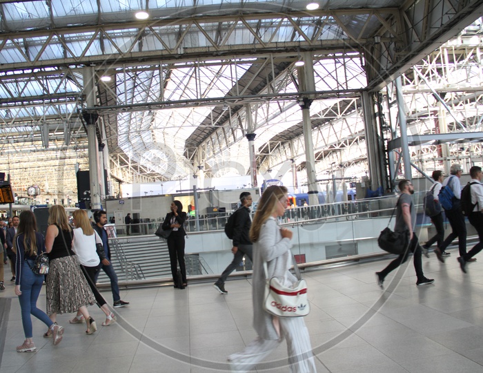 People walking inside Waterloo Railway Station
