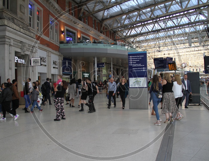 People walking in Waterloo Railway Station, London