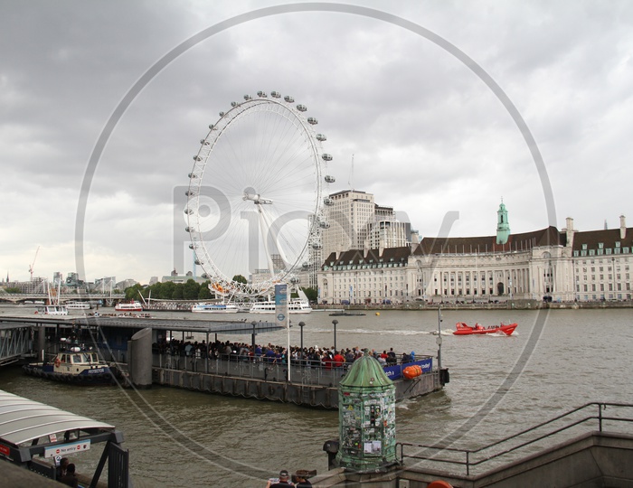 Tourist Boats and London Eye on Thames River