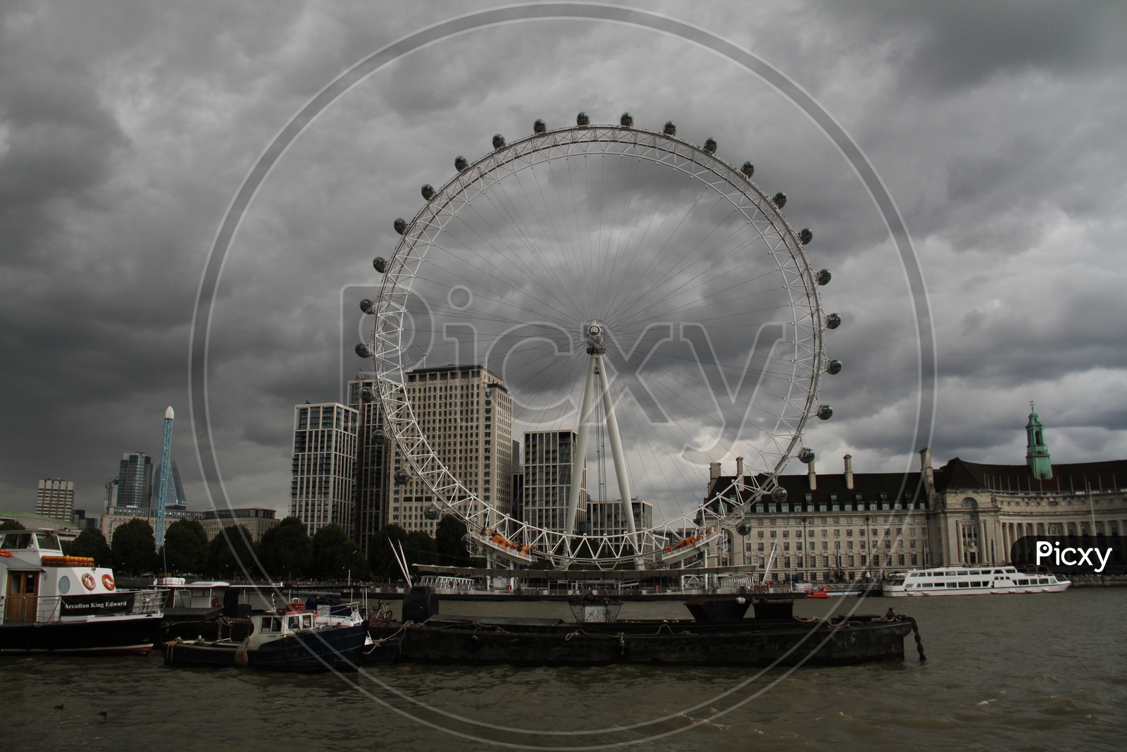 London Eye with Dark Clouds in Background