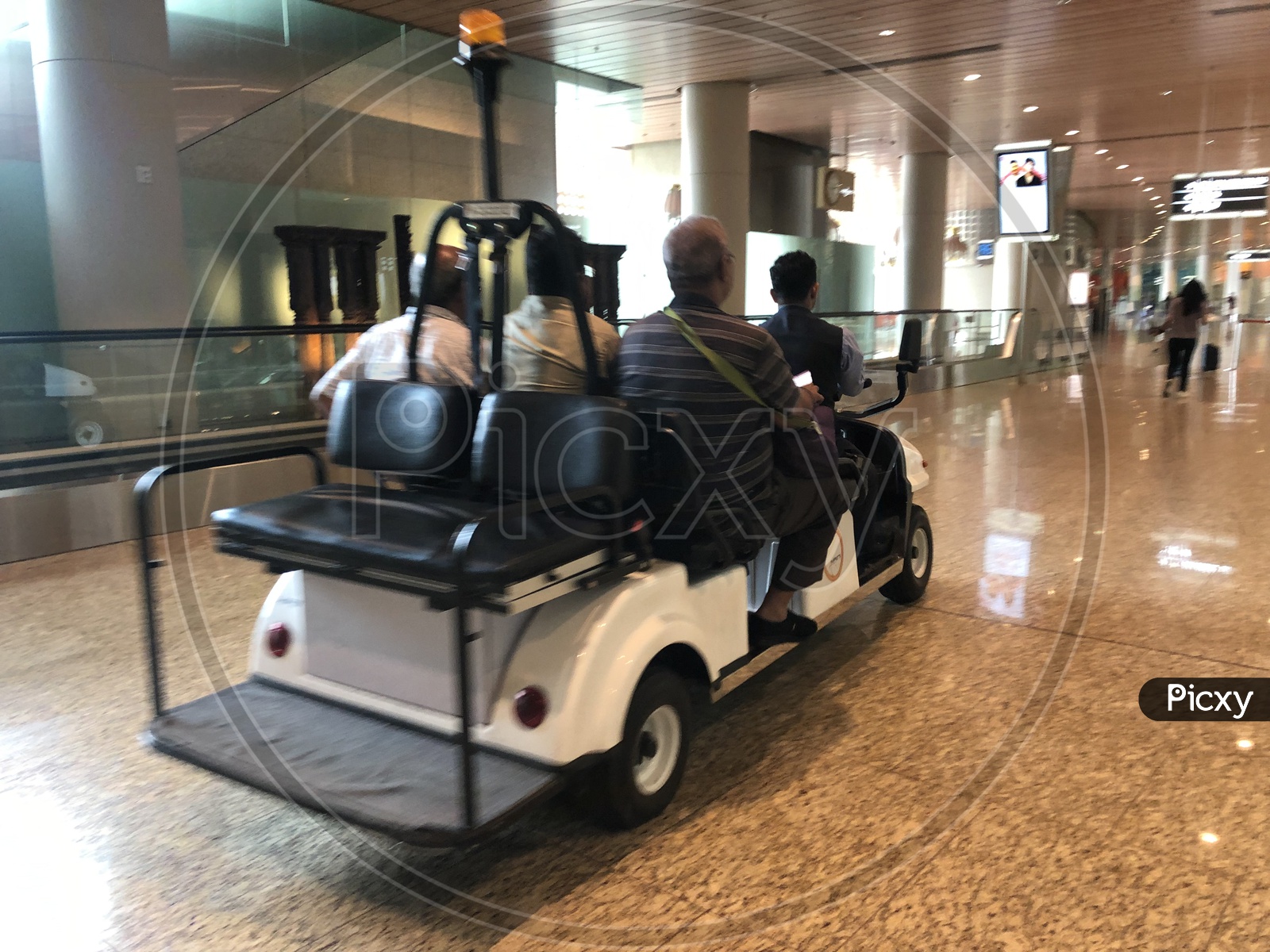 passengers or Senior Citizens using Buggy Free Rides In Mumbai Airport