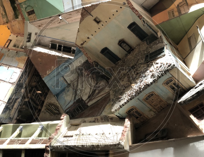 Image of Old Ruins Of Model Houses Modern art in GVK Museum-XB126382-Picxy