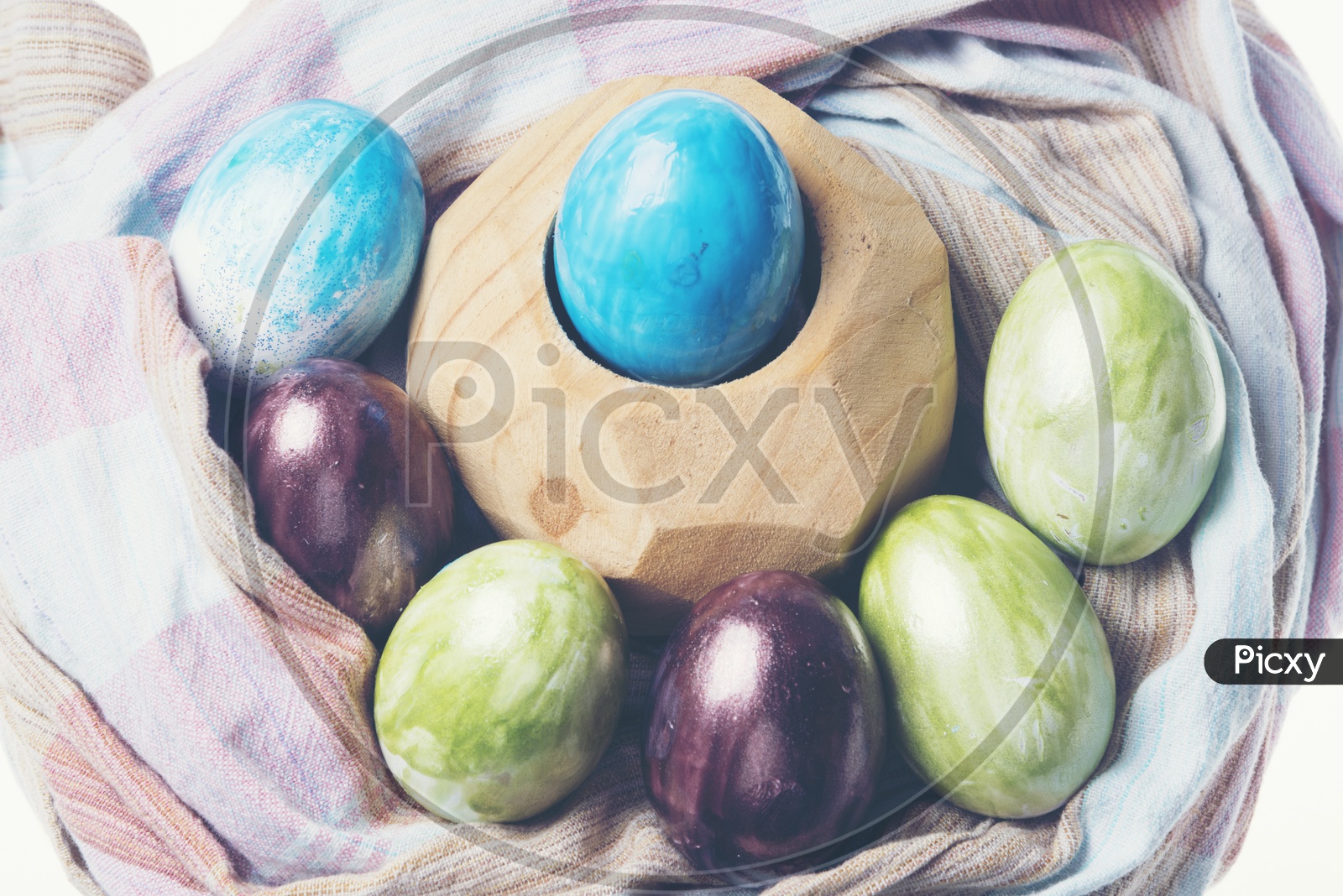 Colorful Handmade Easter Eggs  For Easter Festival on an Cloth Backdrop