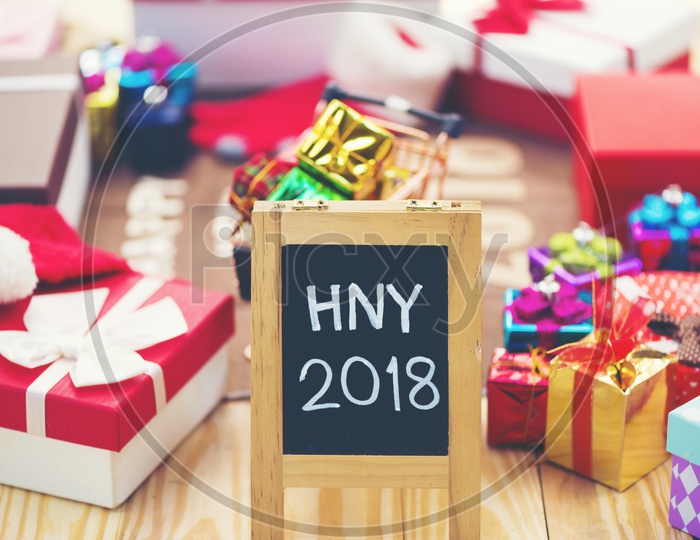 Happy New year 2018 template With Gifts and Wooden Background