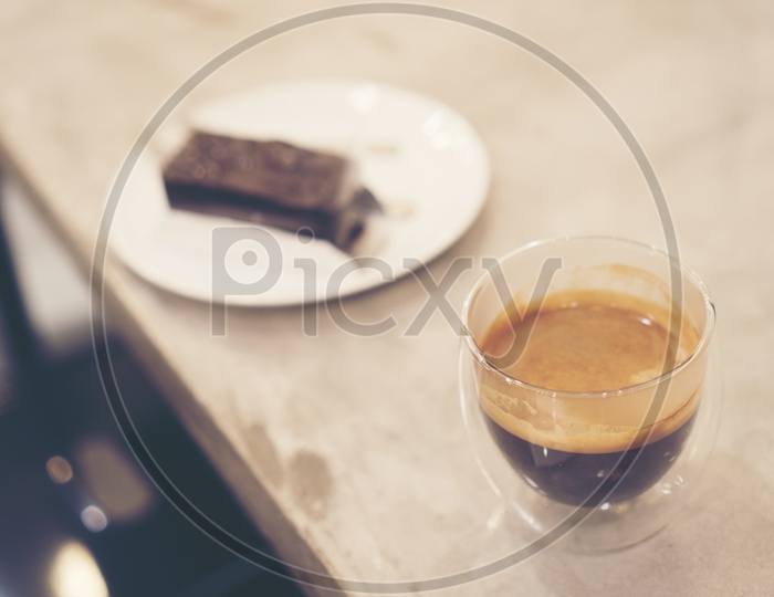 Espresso shot coffee on a wooden table