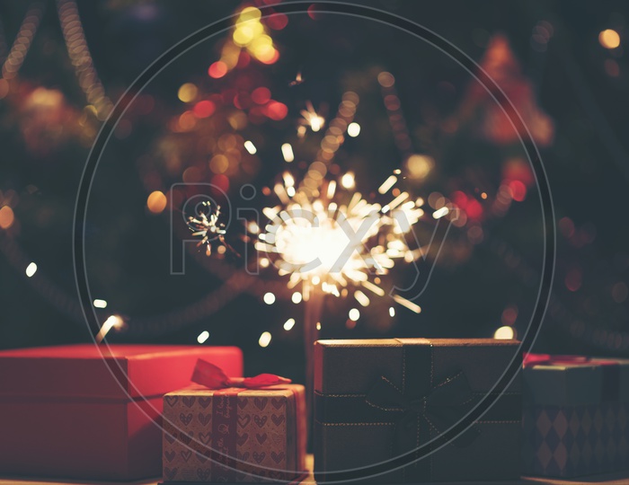 Christmas Gifts And Sparklers Forming a Flat Lay  For Christmas Wishes