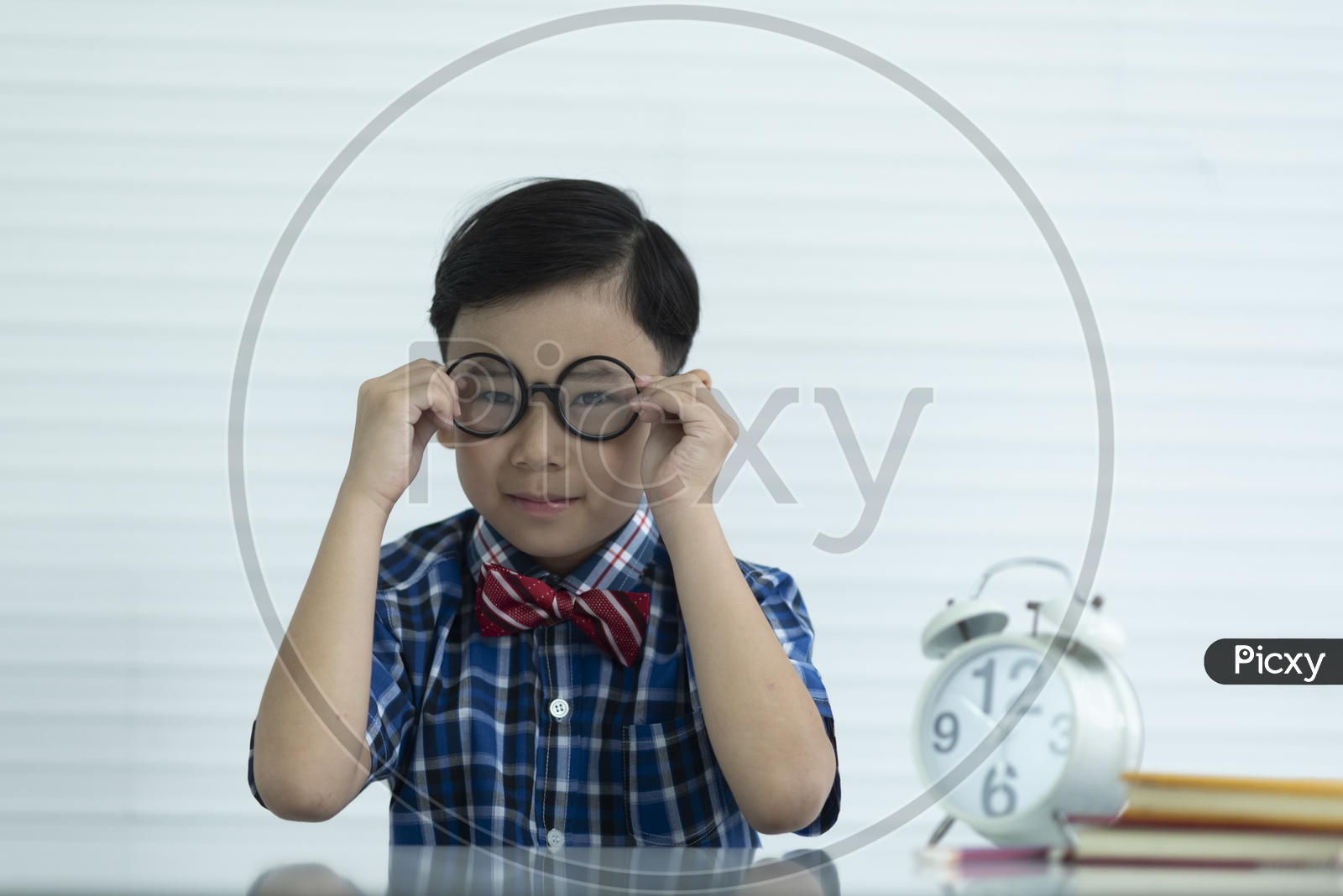 Smart Thai Student or Boy Wearing Spectacles