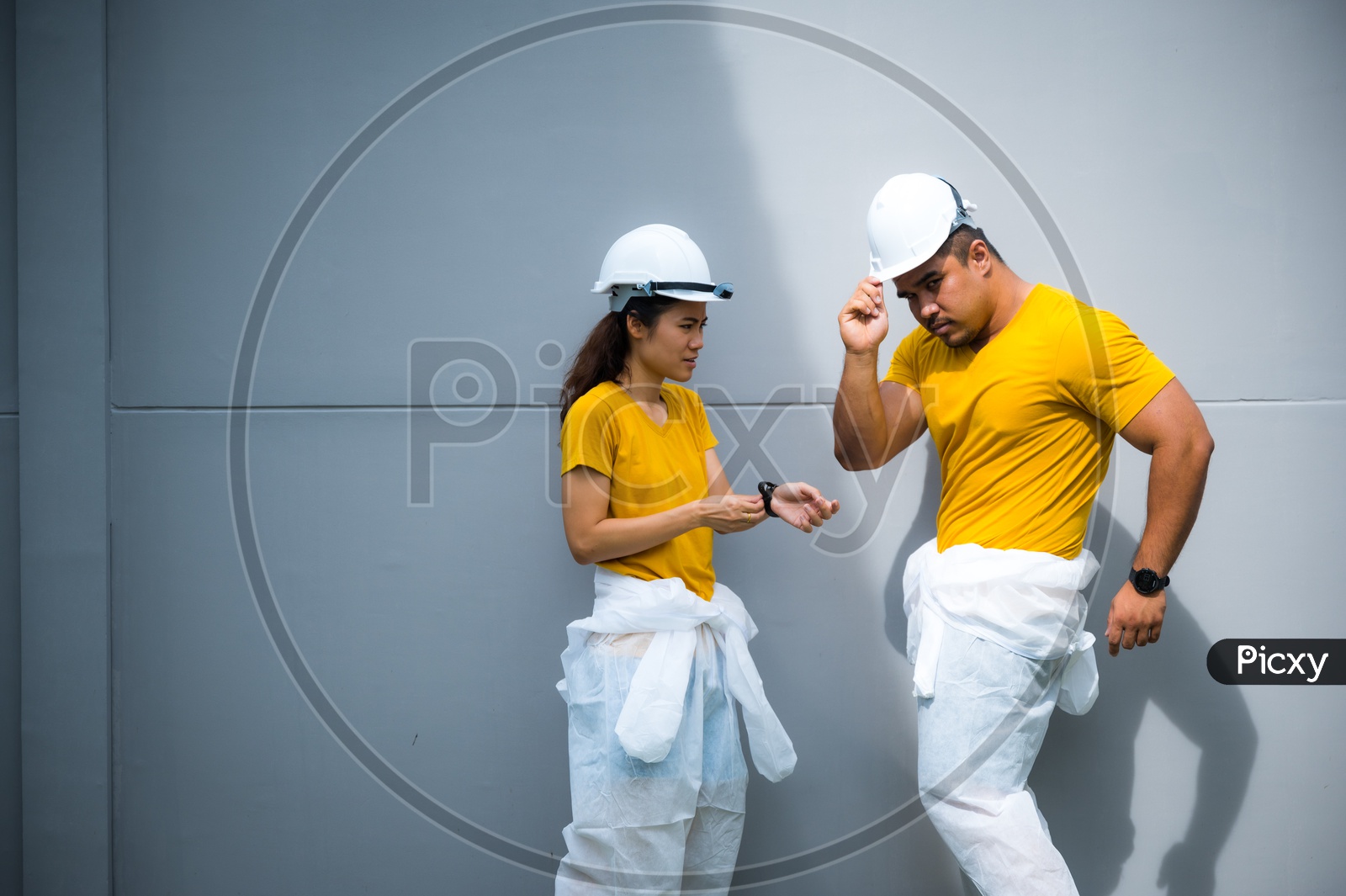 Asian Couple during the house construction