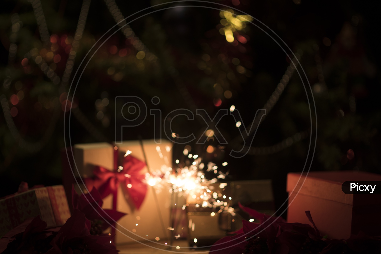 Christmas Or New Year Template Background With Gifts , Decorated tree And Sparking  Firework Stick