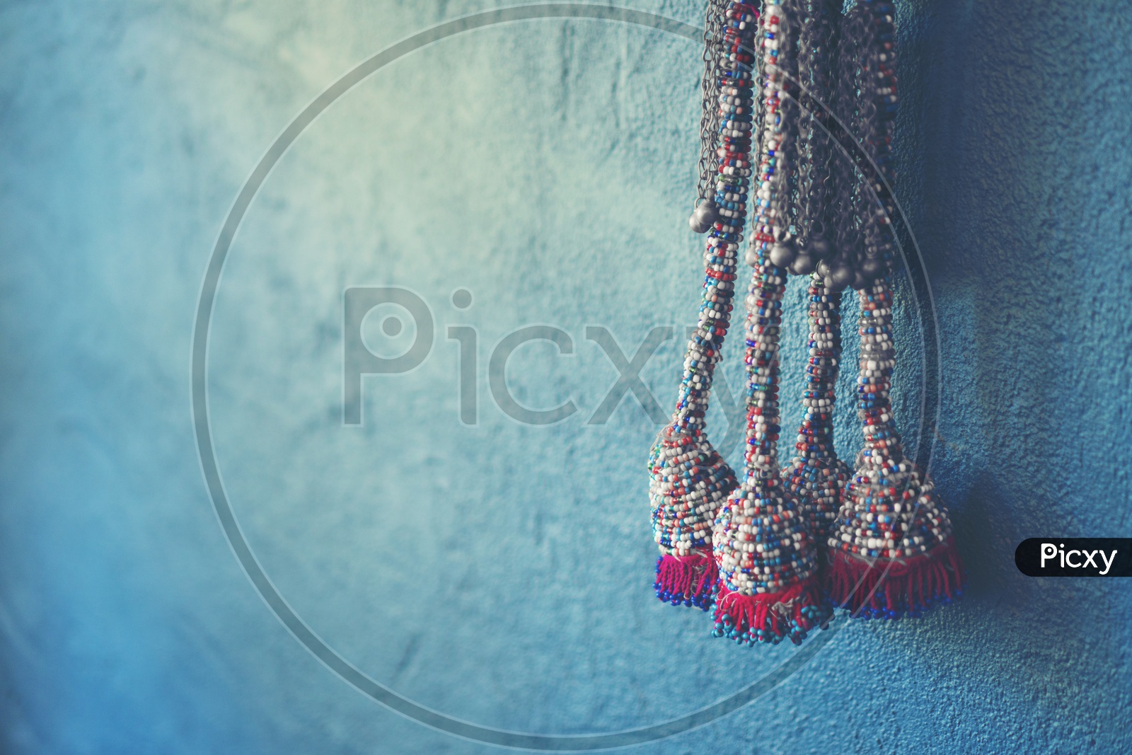 Close up of Blue wall background with knitting yarn