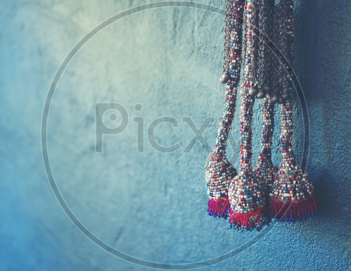 Close up of Blue wall background with knitting yarn