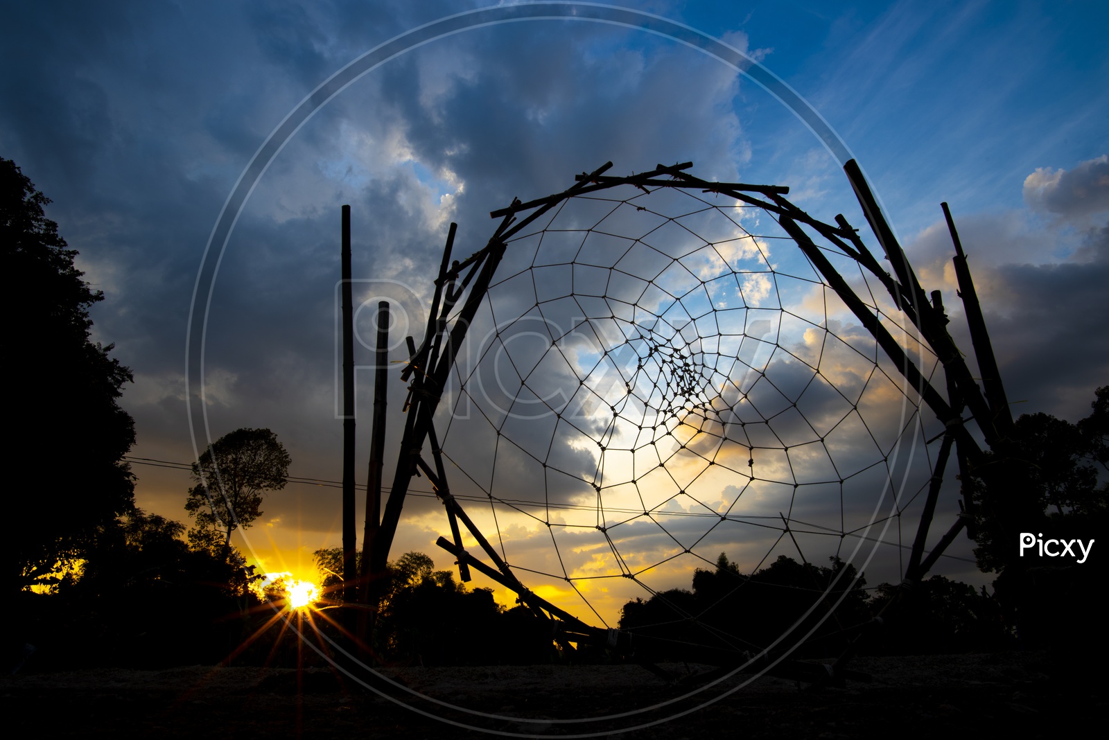 Silhouette of Big dream-catcher at sunset