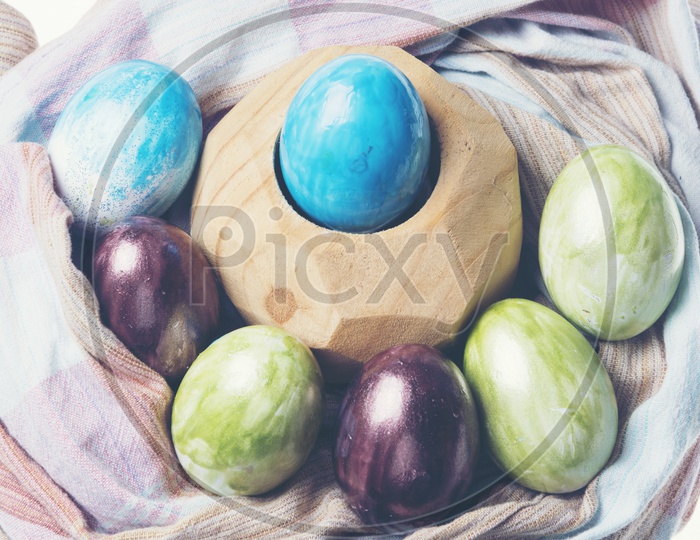 Colorful Handmade Easter Eggs  For Easter Festival on an Cloth Backdrop