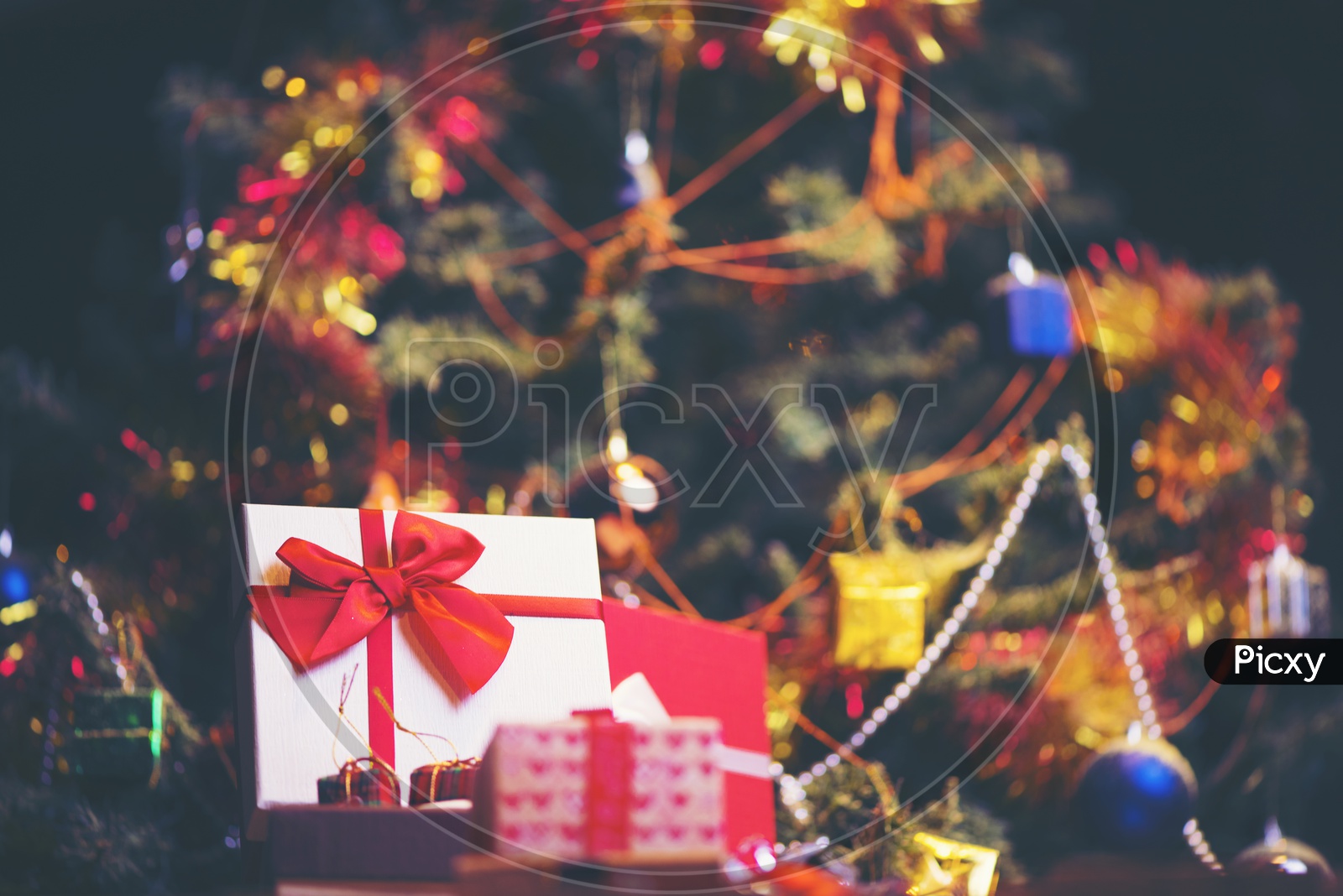 Decorated Christmas  Tree And Gift With Led Bokeh Background , templates For Christmas Festival  and New Year