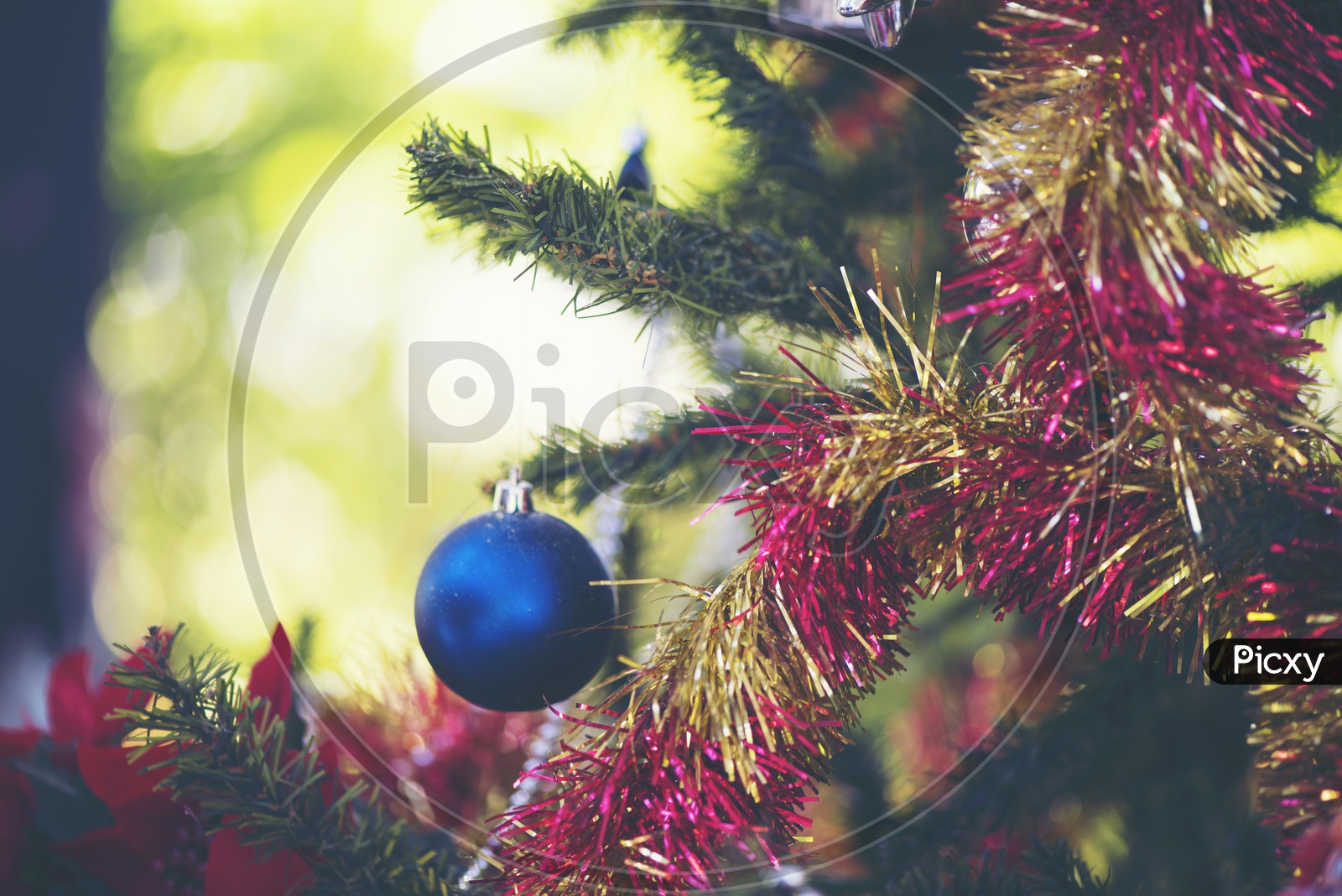 Decorated Christmas Tree With Jingle Bells  and  Gifts  Forming Backgrounds For Christmas