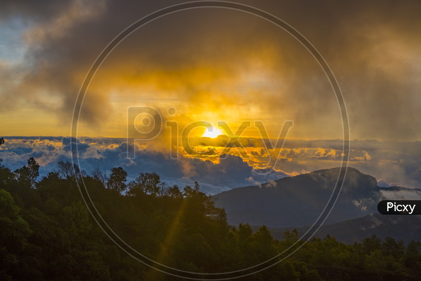 Sunset Over Mountain With Foggy Clouds  In Khao Yai National Park