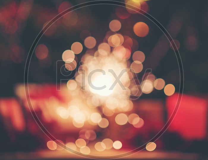 Christmas Or New Year Template Background With Gifts , Decorated tree And Sparking  Firework Stick  Bokeh  Background