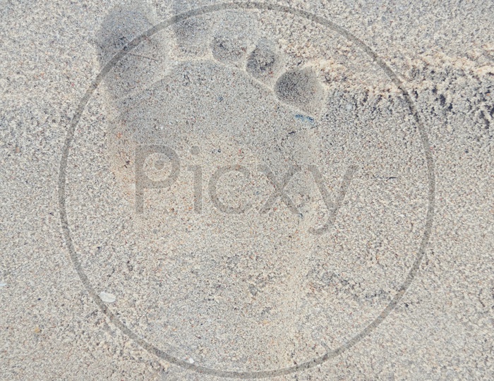 human footprint on the sand beach, Thailand