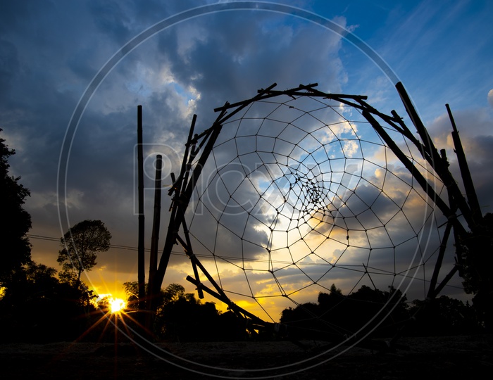 Silhouette of Big dream-catcher at sunset