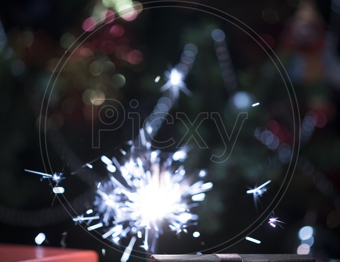 Burning Sparklers With Christmas Gifts Forming Templates For Christmas Festival