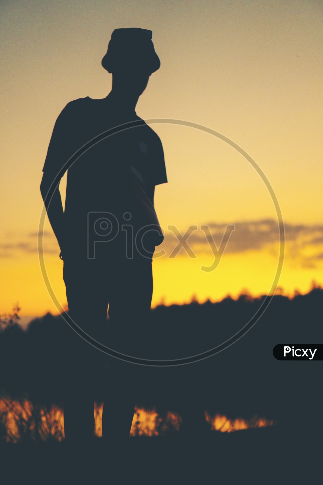 Silhouette of alone man during sunset