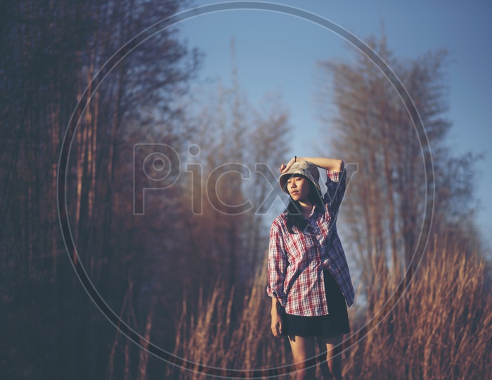 Asian woman posing in the nature