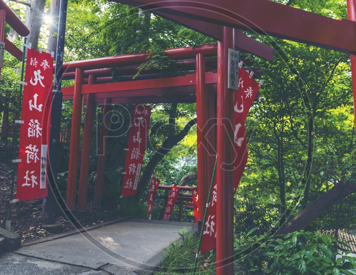 Pathways In  a japanese temple With Red Flags