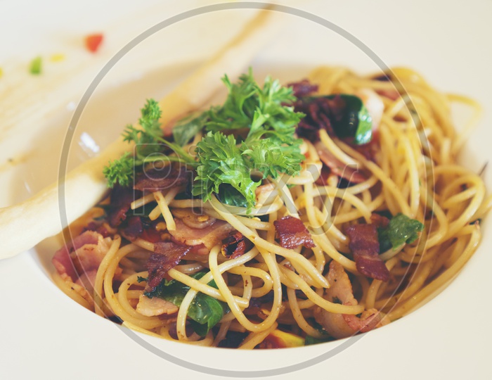 Spaghetti al sugo pomodoro basilico Dish  Served In a Restaurant