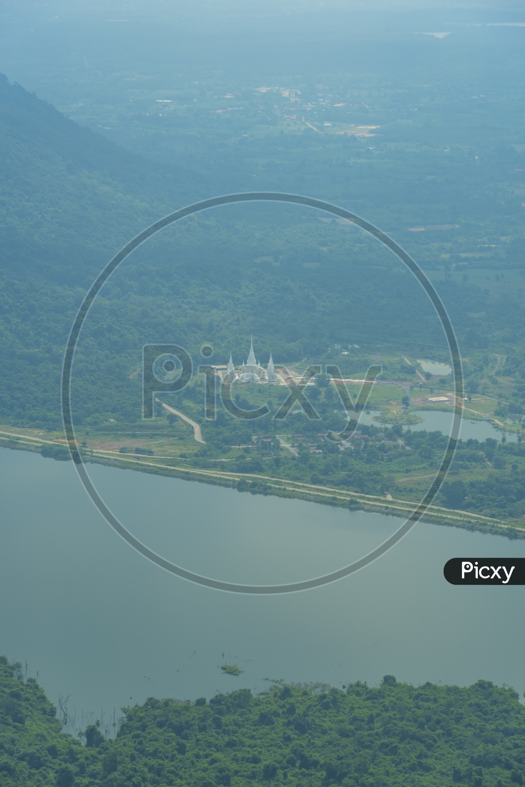 Aerial View Of River Channel With  Buddhist Temple