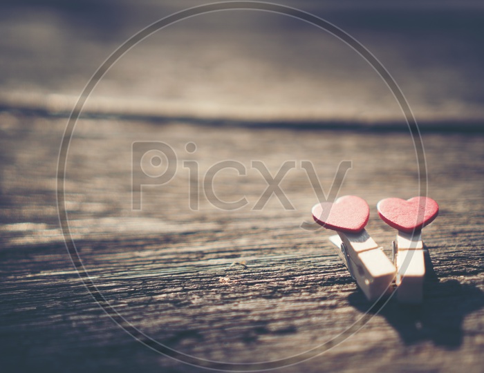 Love hearts On an Wooden Table Closeup With Copy Space Forming a Template For Valentine's Day