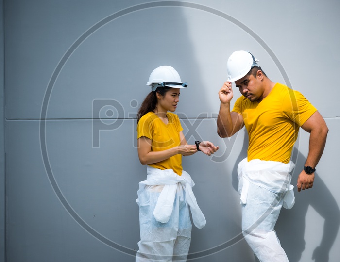 Asian Couple during the house construction