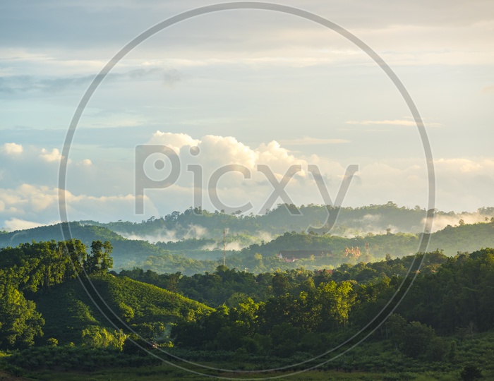 Landscape View Of Mountain Layers With  Cotton Clouds  And sky As Background in Khao Yai National Park