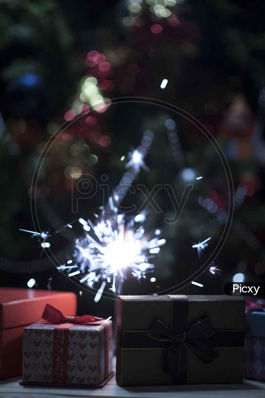 Burning Sparklers With Christmas Gifts Forming Templates For Christmas Festival