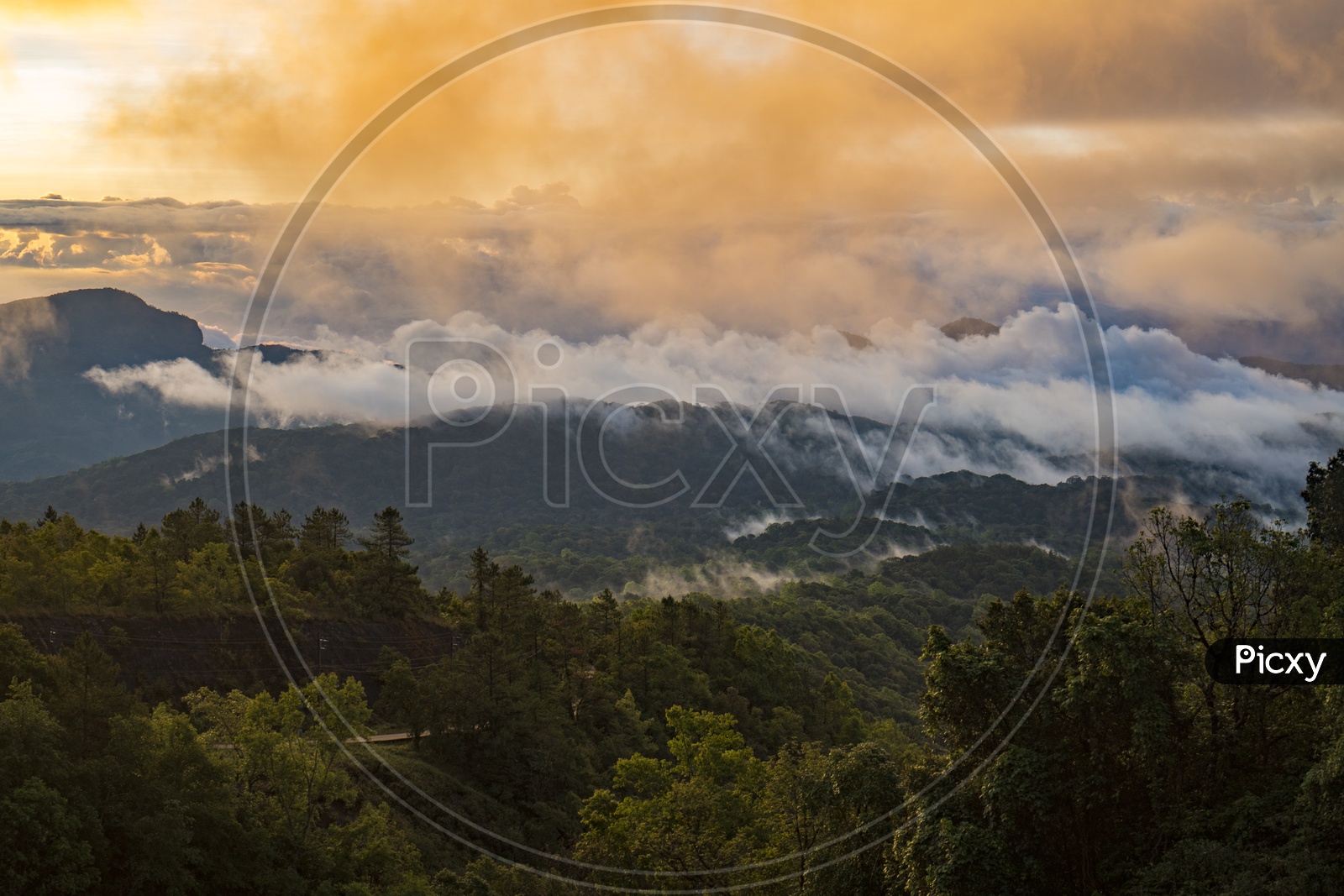 Landscape Of  Mountain Layers With Snow Clouds And Sunset Sky In Khao Yai National Park