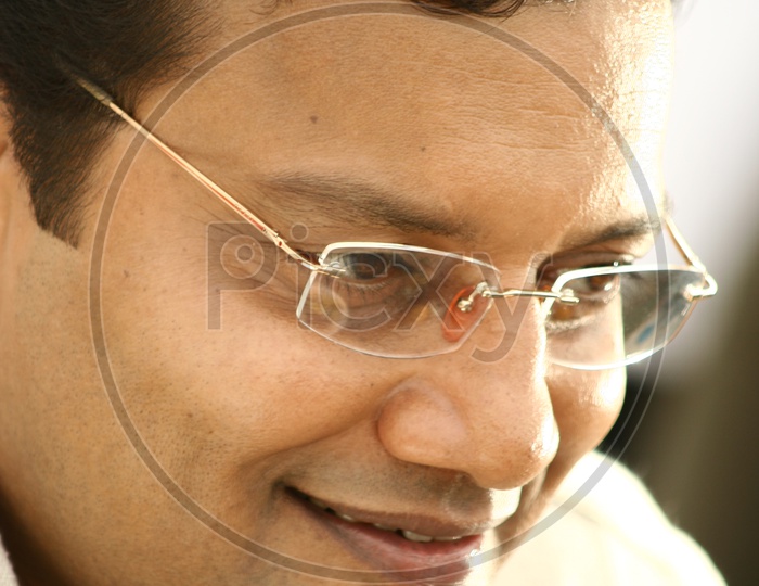 Actor Sai Kumar wearing glasses